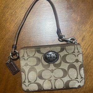 Coach Signature Brown Wristlet. Used. Zippered. Lobster Clasp.